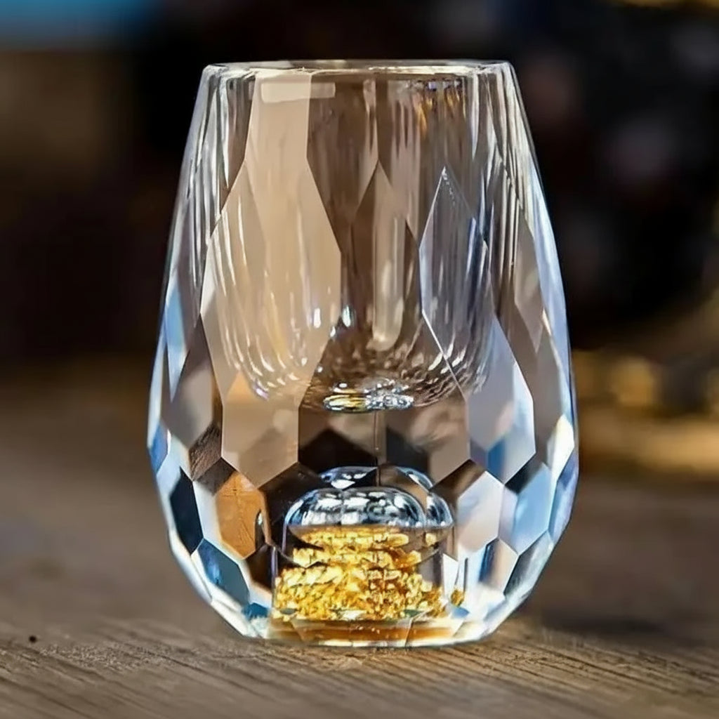 Clear crystal whiskey glass with diamond-cut design