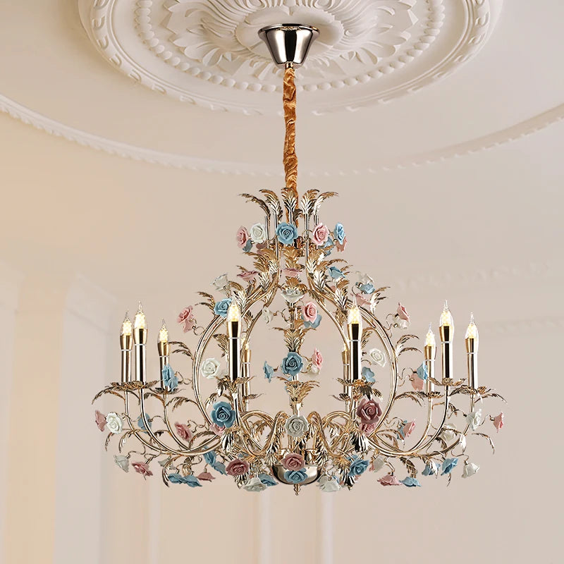 Decorative chandelier with floral designs on a ceiling